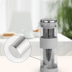 Clear glass bottle with metal infuser 