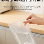 Hand sealing a clear plastic bag 