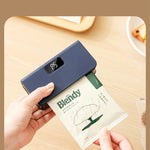 Sealing machine being used to seal a package 